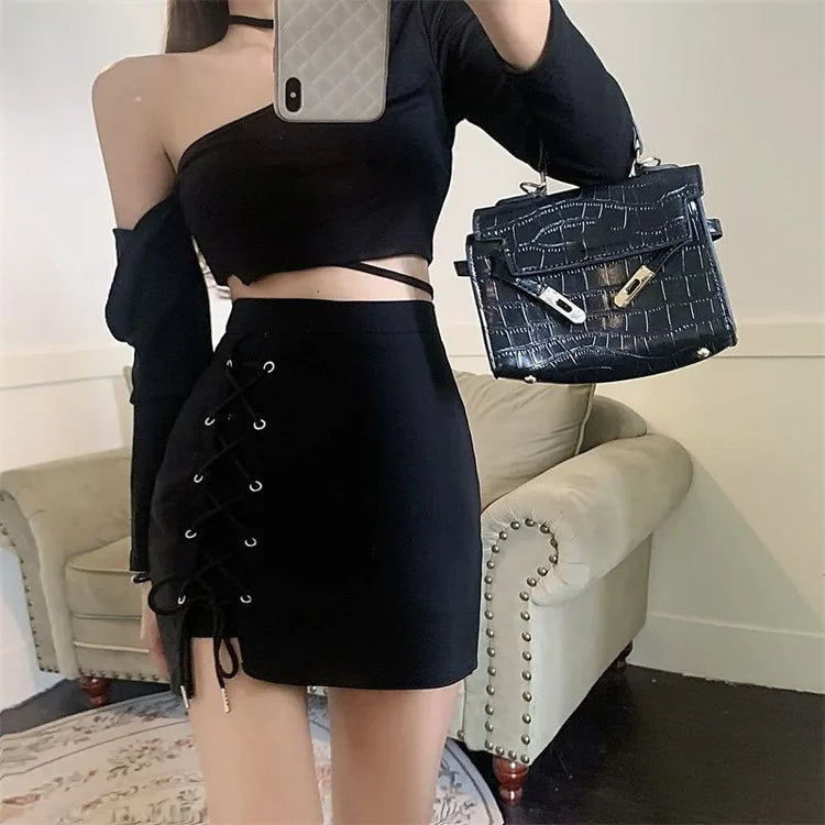Model taking a selfie in the Laced With Attitude Mini Skort in black