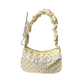 The Lacy Dotling Purse, a yellow polka-dot lace-trimmed purse, isolated by itself.