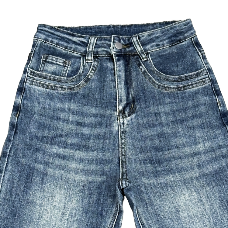 Front close-up view of the Main Mood Cloud-Stretch Flare Jeans in classic denim blue.