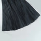 Flat lay front view of the Midnight Butterfly Maxi Dress with skirt spread to highlight pleated flow.