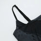 Close-up flat lay of the Midnight Butterfly Maxi Dress showing straps and upper section.