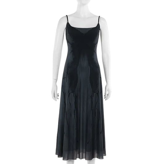 Midnight Butterfly Maxi Dress displayed on a mannequin from the front, showing flowy silhouette and butterfly print.