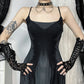 Close-up of model wearing the Midnight Butterfly Maxi Dress showing neckline, straps, and butterfly print detail.