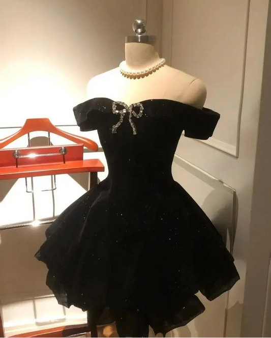 Angled front view of the Midnight Gala Bow Dress showing the sparkly velvet and sculpted bodice.