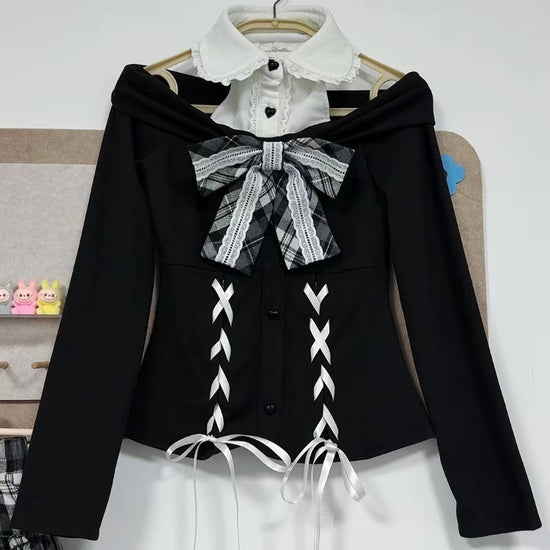 The sweater of the Midnight Manor Skort Set on a hanger, showcasing the faux two-piece design, halter off-the-shoulder look, corset-inspired lace-up front, black heart-shaped buttons, and statement bow.