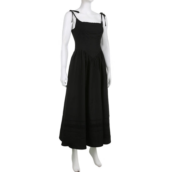 The Midnight Sonata Corset Dress on a white mannequin, showing the three-quarter view of the dress, full length, and silhouette.
