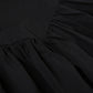 Close-up of the corset-inspired paneling on the front of the Midnight Sonata Corset Dress.