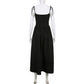 The Midnight Sonata Corset Dress on a white mannequin, showing the back of the dress, full length, and silhouette.