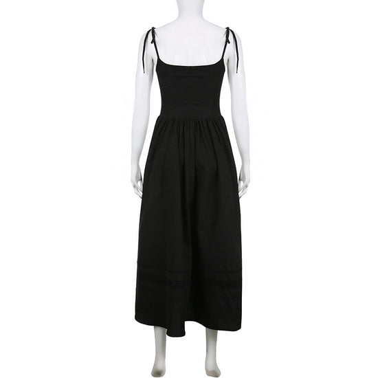 The Midnight Sonata Corset Dress on a white mannequin, showing the back of the dress, full length, and silhouette.