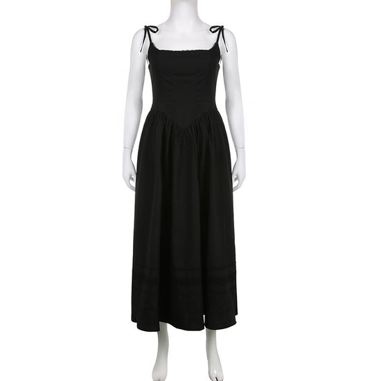 The Midnight Sonata Corset Dress on a white mannequin, showing the front of the dress, full length, and silhouette.