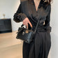 Model wearing the Moonlit Mourning Crossbody across the front.
