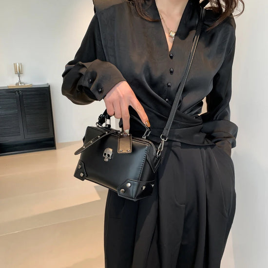 Model wearing the Moonlit Mourning Crossbody across the front.