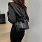 Model wearing the Moonlit Mourning Crossbody over the shoulder.