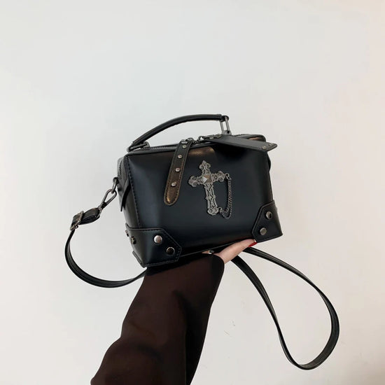 Side view of the Moonlit Mourning Crossbody featuring the cross design.