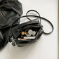 Open view of the Moonlit Mourning Crossbody showing the interior compartment.