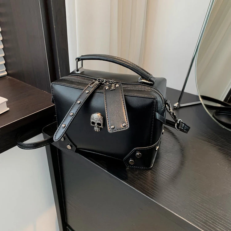 Front view of the skull version of Moonlit Mourning Crossbody displayed on a table.