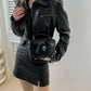 Model styling the skull version of the Moonlit Mourning Crossbody with a black outfit.
