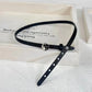 Black faux leather choker with rose centerpiece detail.