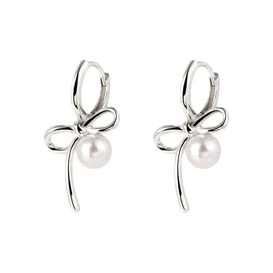 Silver Pearl Whim Bow Earrings displayed on white background