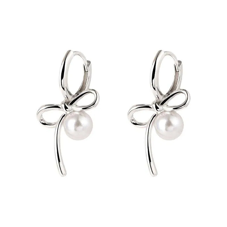 Silver Pearl Whim Bow Earrings displayed on white background