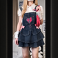 Pocket Full of Love Overall Dress layered over a white blouse, full front view