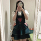 Pocket Full of Love Overall Dress worn over a white ruffle blouse in a mirror selfie