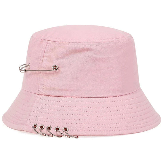 Side view of the Rebel Pin Bucket Hat in pink featuring multiple safety metal rings along the brim.