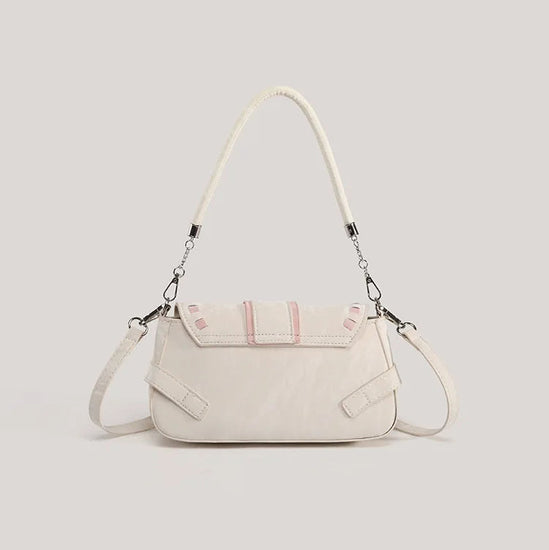 Back view of the cream Ribbon Romance Shoulder Bag, showcasing the soft velvety finish and detachable shoulder strap.