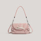Pink Ribbon Romance Shoulder Bag with a soft velvety finish, statement ribbon bow, interwoven ribbon detailing, and heart-shaped buckle accents.