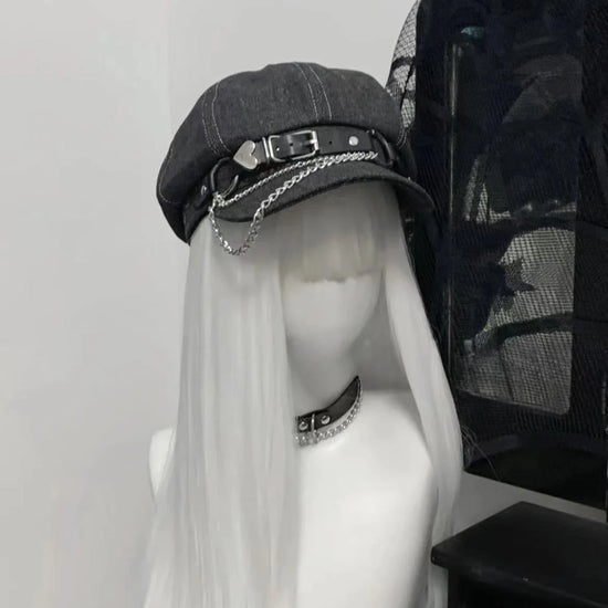 Rogue Chain Newsboy Cap in black with silver chain and heart buckle low angle front view