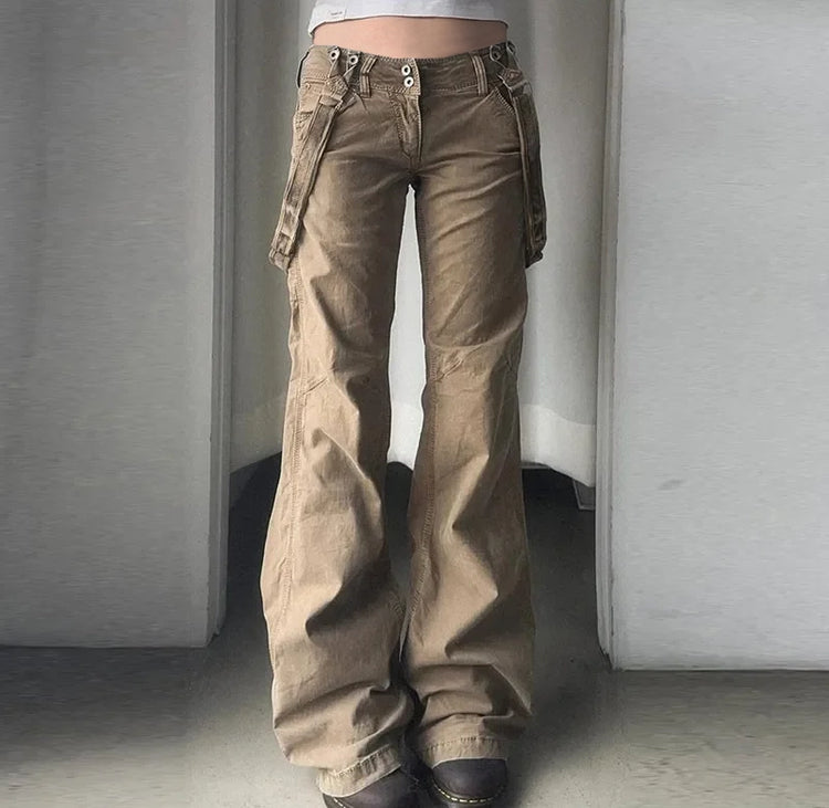 Closer view of the front of the Rogue Revival Utility Pants with strap accents and flared hem