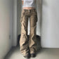 Front view of the Rogue Revival Utility Pants with strap accents and flared hem