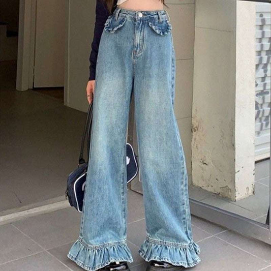 Model wearing Ruffle Flare Wide Leg Jeans, showing ruffle hems, high-waisted fit, and ruffle faux front pockets