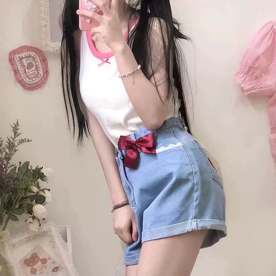 Front-facing look with the red bow styled for a soft girl vibe in the Scarlet Sweetheart High-Rise Shorts.