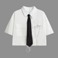 White short-sleeve cropped button-up shirt from the Shadow Chain Utility Set featuring a matching black tie, removable safety pin with chain, and adjustable drawstring waist.
