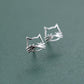 Silver Kitty Stud Earrings shown at an angle with open cat faces and dimensional whisker details.