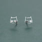 Close-up of the Silver Kitty Stud Earrings showing their open cat faces and dimensional whiskers.