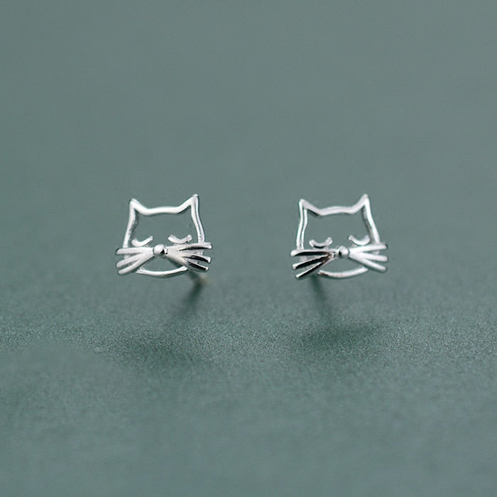Close-up of the Silver Kitty Stud Earrings showing their open cat faces and dimensional whiskers.