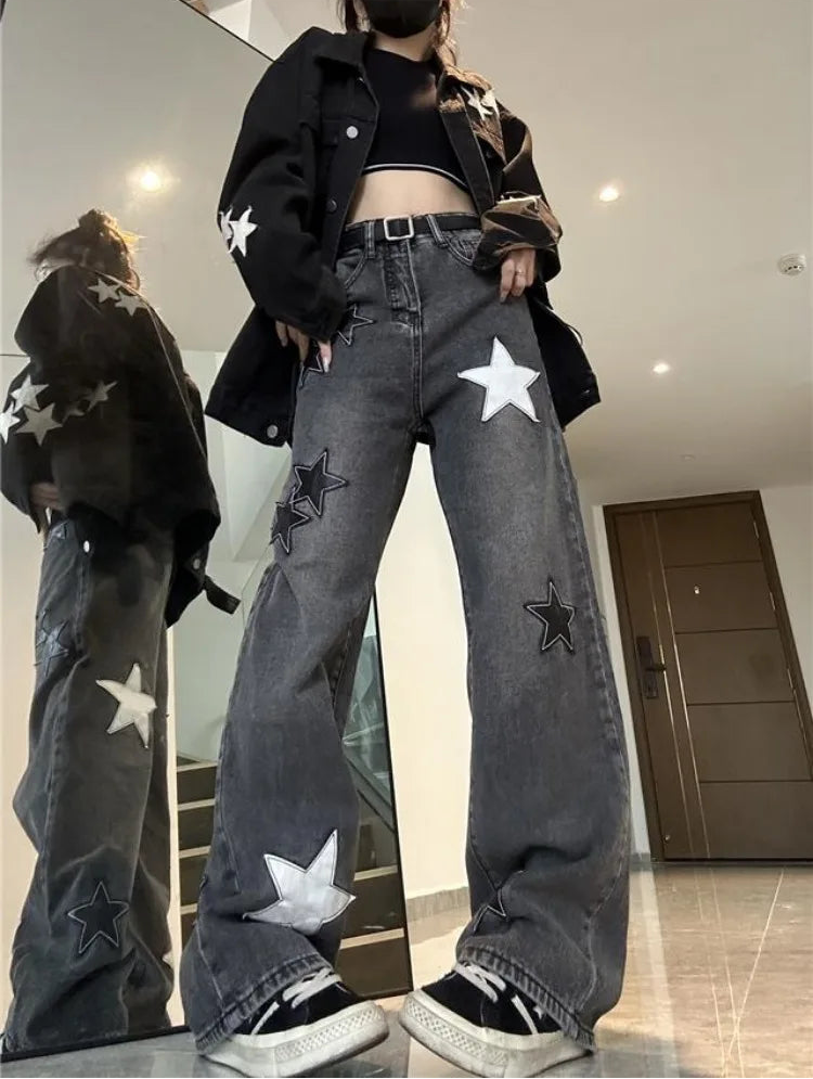 Model wearing the Stargaze Street Jeans in black gray, wide-leg high-rise fit.