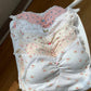 Sweet Flower Crop Tops in various floral and heart prints, displayed in natural sunlight