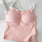 Pink Sweet Flower Crop Top laid flat next to open book, showcasing soft heart pattern and lace neckline.