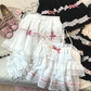 Close-up comparison of the white/pink and black/pink Sweet Love Lace Bow Skort color options with matching tops.