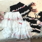 Comparison of the white/pink and black/pink Sweet Love Lace Bow Skort color options with matching tops.
