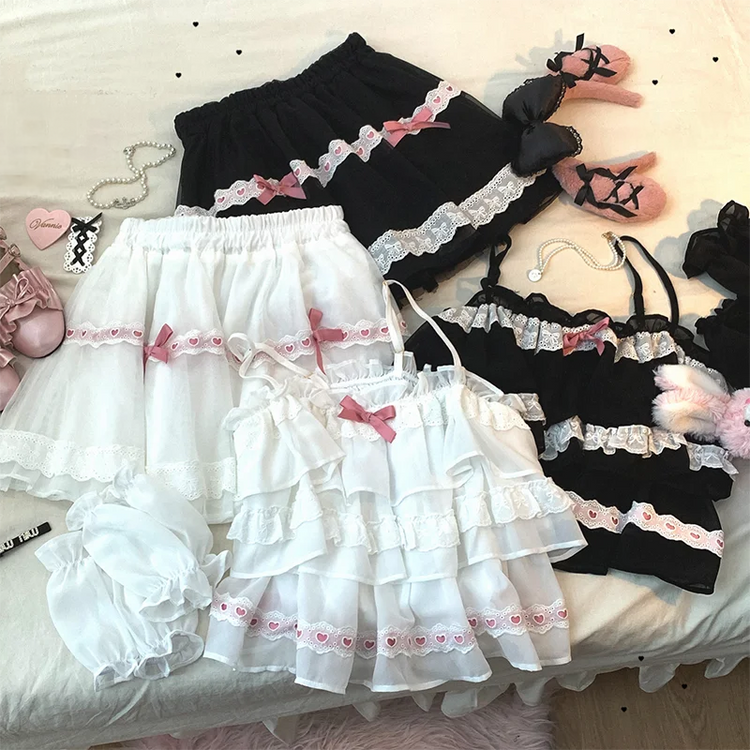 Comparison of the white/pink and black/pink Sweet Love Lace Bow Skort color options with matching tops.