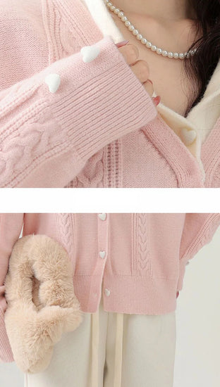 Close-up detail of the Sweetheart Cable Knit Cardigan's texture, soft fabric, and heart buttons
