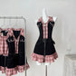 Black and pink Sweetheart Stitch Denim Dresses displayed together on a mannequin and clothing rack.