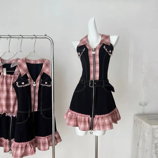 Black and pink Sweetheart Stitch Denim Dresses displayed together on a mannequin and clothing rack.