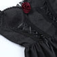 Close-up of the bodice on the Thorned Rose Corset Dress, showing rose appliqué, lace trim, and embossed butterfly print.