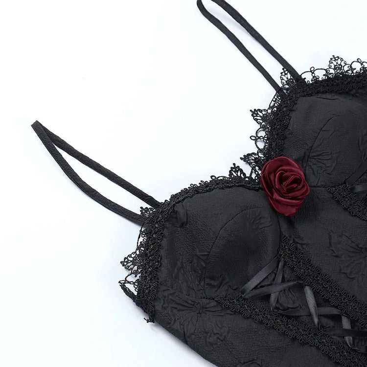 Detailed close-up of the straps and bodice on the Thorned Rose Corset Dress, showing rose appliqué and lace trim.