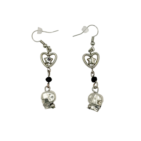 Til Death Do We Sparkle Earrings, black variant, shown from side angle highlighting silver skull and faceted black bead.